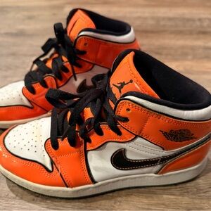 Air Jordan Kids Black and Orange Sneakers